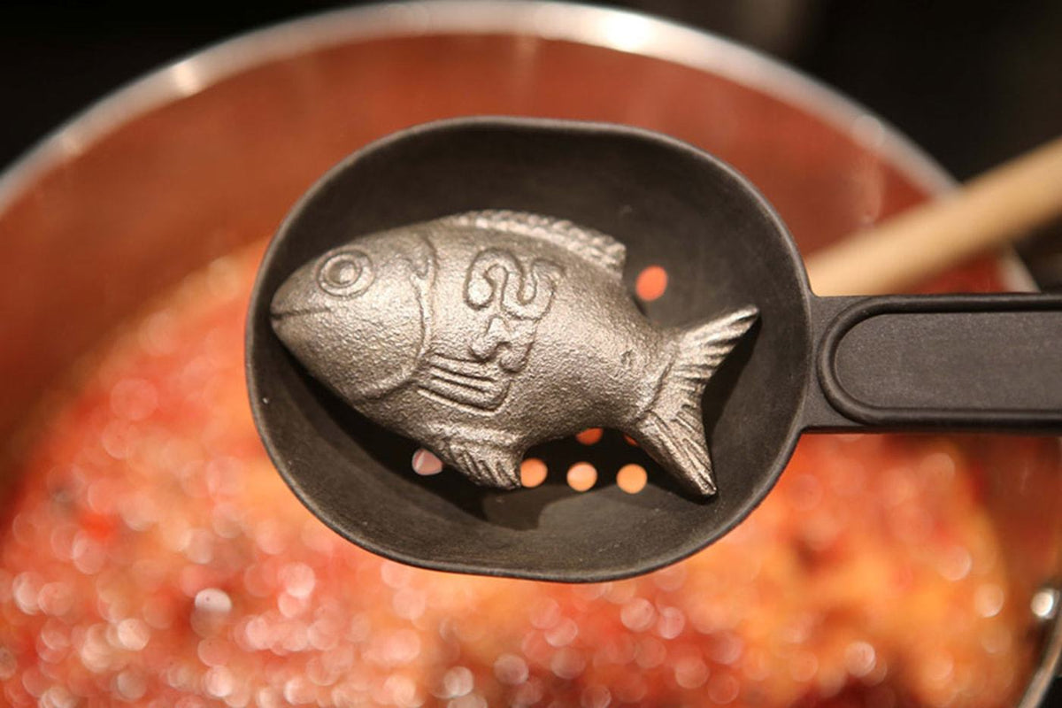 Picked up a Lucky Iron Fish for when I have to cook in the stainless steel  pot. : r/castiron