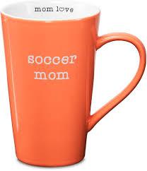 Orange latte mug with "soccer mom" printed in white on side of mug and "mom love" printed in black on rim of white interior (a heart in place of the "o" in "love").