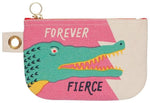 Beige and pink zipper pouch with illustration of green crocodile with red eye and open mouth showing green teeth. Text: "Forever" in white above crocodile head and "Fierce" in black underneath. 