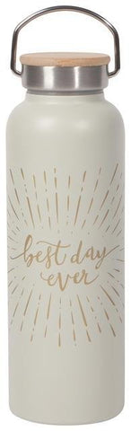 White water bottle with gold text in cursive reading "best day ever" in the middle of the side, with gold lines radiating from it. Stainless steel and wood lid with handle.