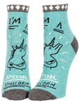 Turquoise socks with grey trim. Cartoon of sassy unicorn with folded arms, surrounded by text, "I'm A Special Unicorn." 
