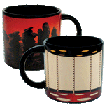 Gif of heat changing Star Trek Transporter Mug shows Uhura, Spock, Kirk and McCoy (original series actors) disappearing from the transporter on one side of the mug and appearing on a planet in front of craggy rock formations and a red sky on the other side. 