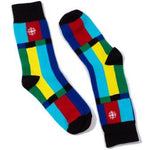 Pair of socks with a design inspired by the colorful CBC standby screen. Dark blue, pale blue, yellow, dark green and red stripes with black accents.