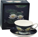 Monet Water Lilies Cup & Saucer box shows detail from painting, with cup and saucer featuring detail in front of it. 