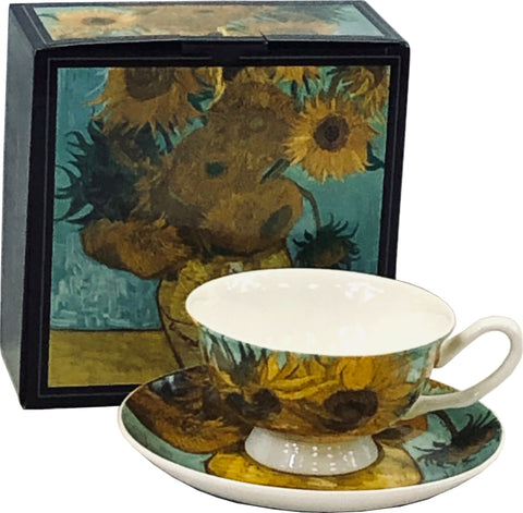 Cup and saucer with detail from Van Gogh's Sunflowers painting, in front of gift box showing full painting.