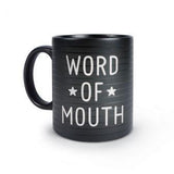 Black mug resembling letter board with example text "Word Of Mouth" in white letters. 